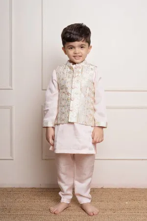 Elegant pastel pink kurta set with an intricately embroidered ivory jacket, perfect for festive occasions