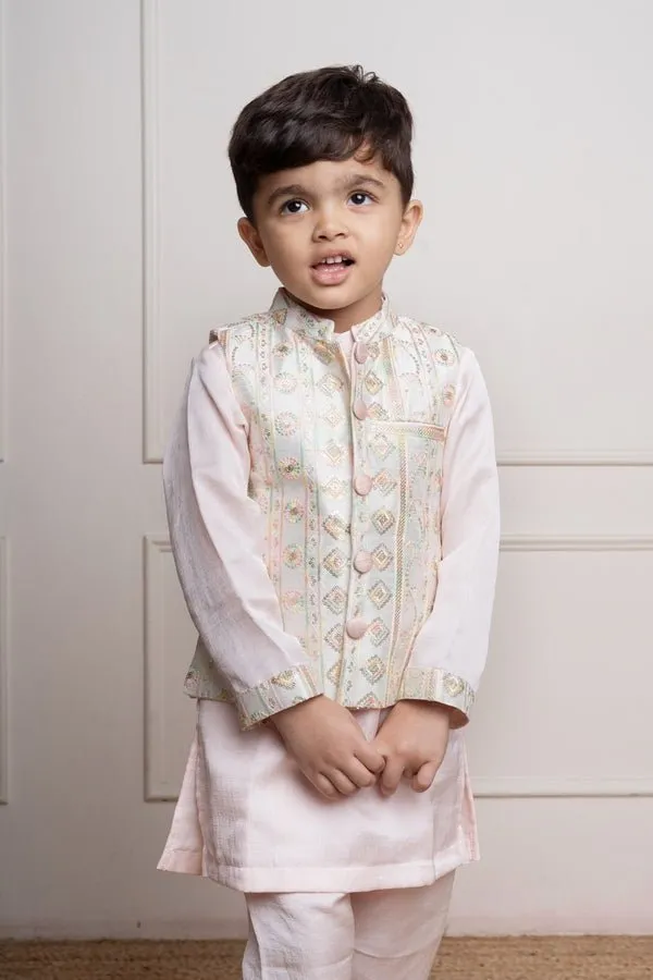 Elegant pastel pink kurta set with an intricately embroidered ivory jacket, perfect for festive occasions