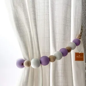 Purple curtain tiebacks